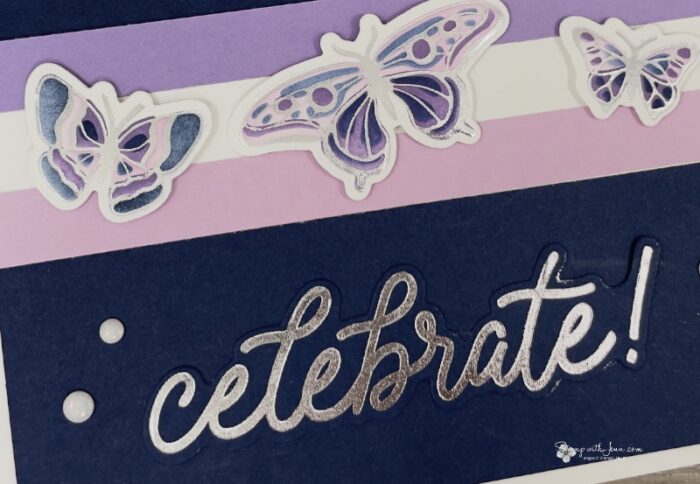 Close-up of three silver hot foiled butterflies on a Night of Navy strip card